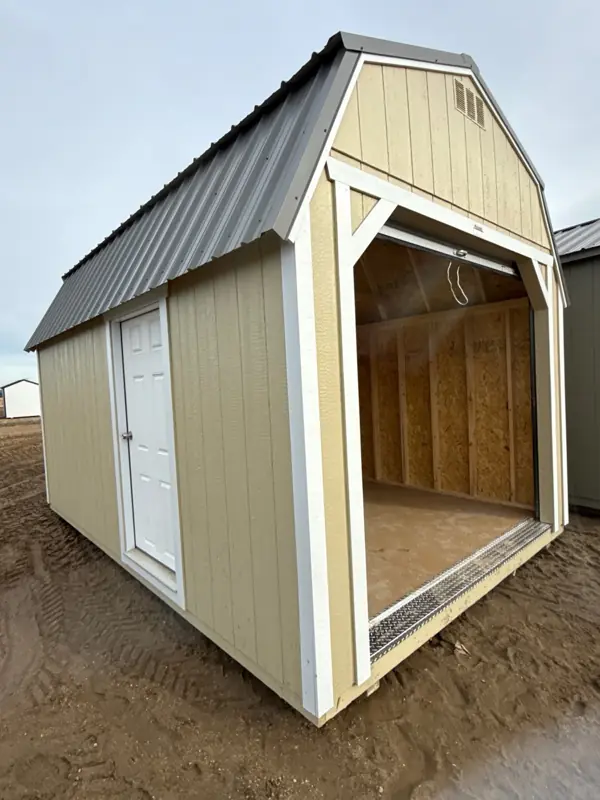 10×16 Lofted Barn (Garage door) storage building on the St. Boni lot