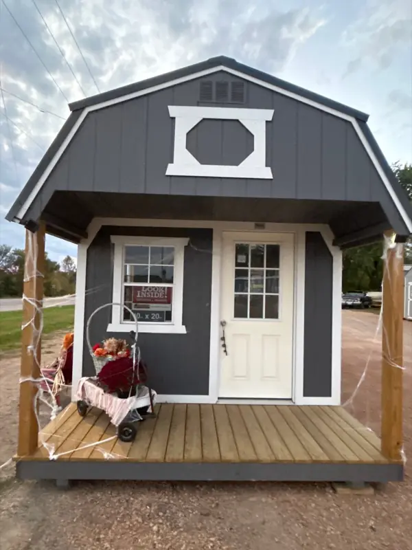 10×20 Lofted Barn (Porch package) storage building on the St. Boni lot